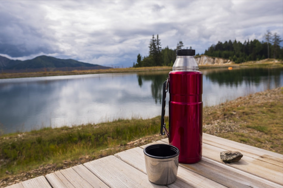 A flask by a lake