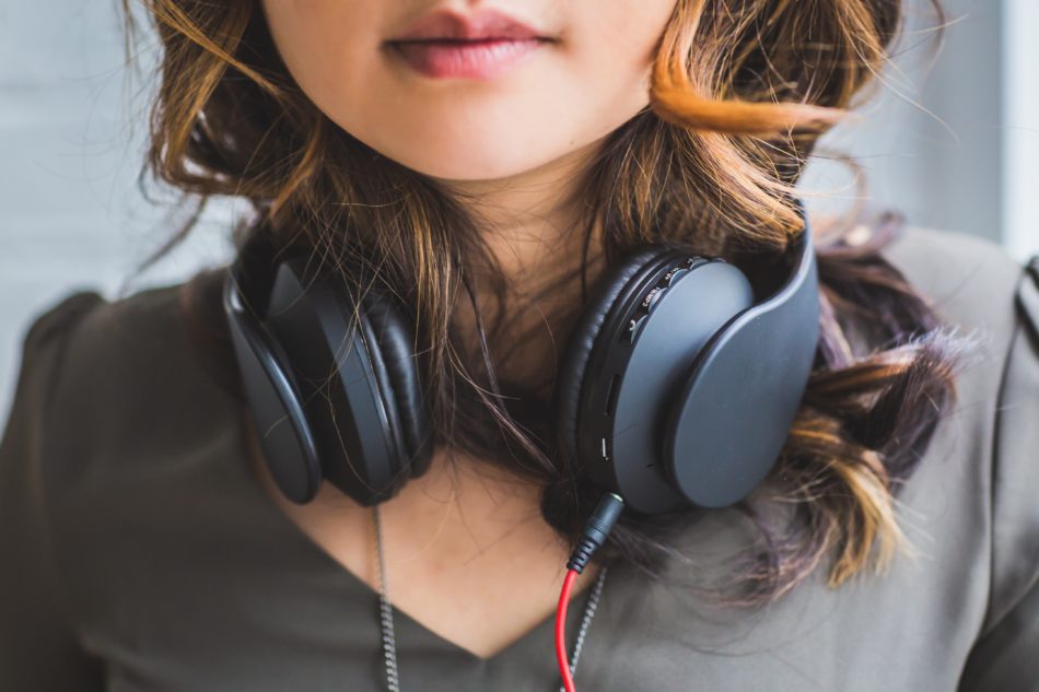 A female with large headphones on